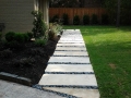 stone pavers path through grass