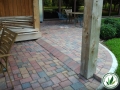 stone brick patio with wood post
