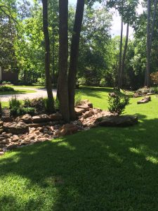Flagstone pathway and rock granite flower bed in Irving, TX
