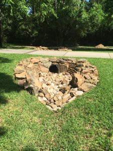 Flagstone pathway over rock granite drainage in Irving, TX