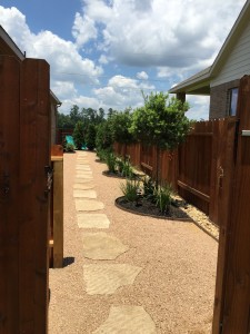Pea gravel pathway and flower bed in Katy, TX